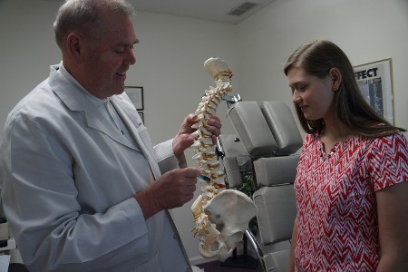 Crowe Chiropractic Doctor Working with Patient